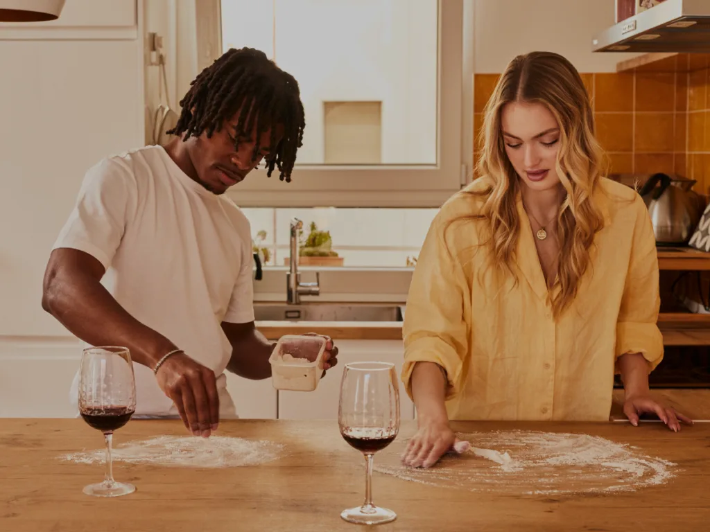 Couple cooking dinner together