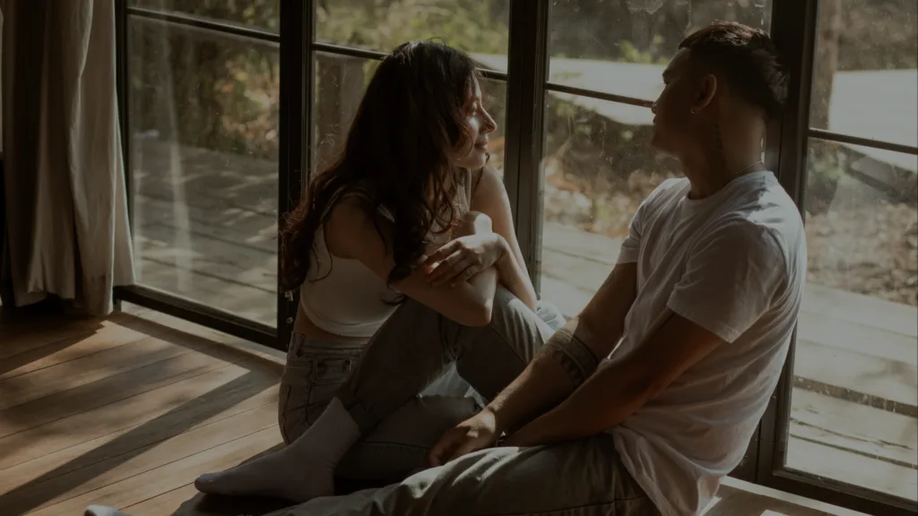 Couple who can communicate well by the window