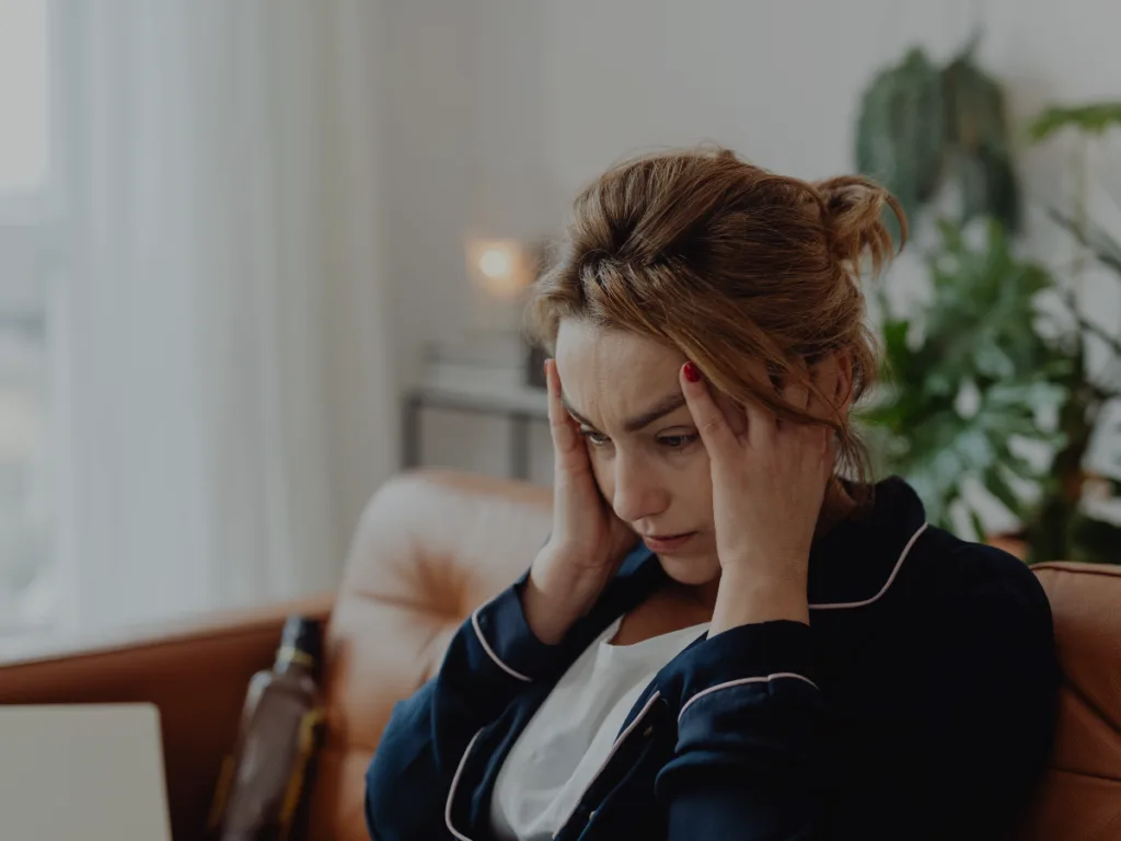 A stressed woman who looks confused and tired.